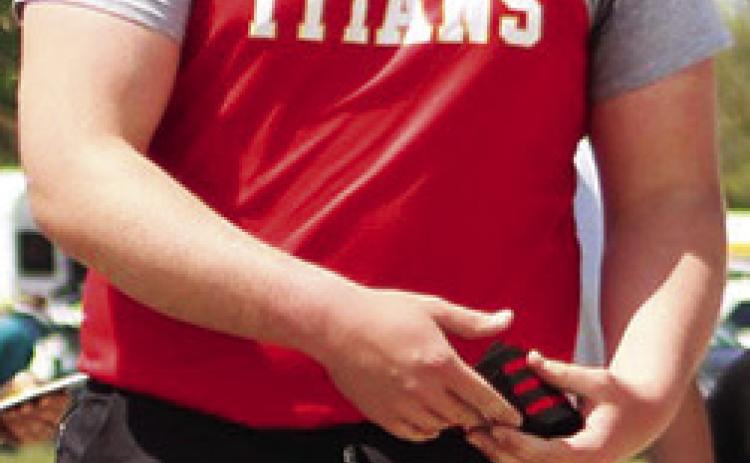 Titan Sophomore, Carter Henry, placed fifth in the discus, Friday, at the Annual Optimist Track and Field Meet in Girard.