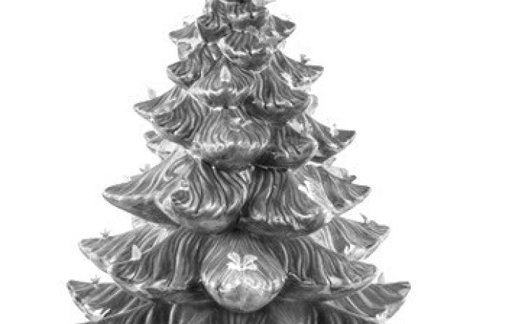 Merry Christmas. Ceramic trees like this one have color, light, and, in this case, music. And they last for decades with no risk of drying out and losing their needles. Photo Caption: Keystone Auctions LLC (c) 2025 by Cowles Syndicate Inc.