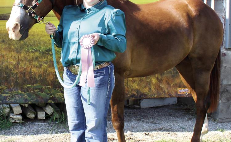 At the Cherokee County 4-H Horse Show July 22, Madisen Rand was the Reserve Champion in Senior Showmanship and received a blue ribbon in 2018 and before geldings Rand also received a red ribbon in Western Pleasure ages 14-18 and a white ribbon in Western Horsemanship ages 14-18.