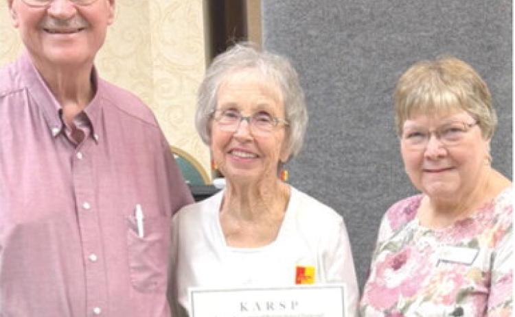 Lois and Jim Carlson, Erie, were recently recognized for their many hours of volunteer service in several community organizations over the past several years, at the 73rd Annual Kansas Association of Retired School Personnel Convention in Junction City. Presenting the award certificate was Kay Sewell, State Community Service Officer. They are members of the Chanute Area chapter of KARSP. Courtesy photo.