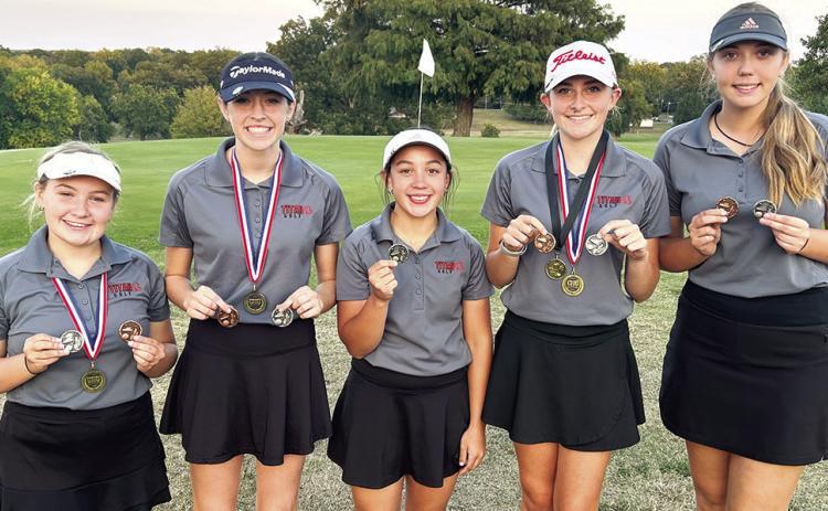 The Columbus Lady Titan Golf Team concluded their regular and CNC League season, Tuesday, at the Baxter Springs Varsity Golf Tournament. Sophomore, Natalie Wary, led the CUHS Team shooting a score of 90 to tie for third place. Columbus placed second behind St. Mary’s-Colgan in the tournament and in the final CNC League standings. Team members are Amory Neely, sophomore; Natalie Wary, sophomore; Hannah Noel, sophomore; Mallory Thompson, senior; and Anna Head, senior. Courtesy photo.
