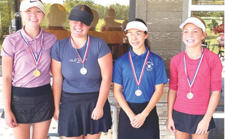 Columbus Junior Golfers, Cali Carpino, Fallon Smiley, and Tyler Kirk placed first, second, and fourth in the girls 12-14 age group at the Columbus Tournament held Tuesday on their home course at the Brush Creek Golf and Grill. Mary Mall, Parsons placed third. Courtesy photo.