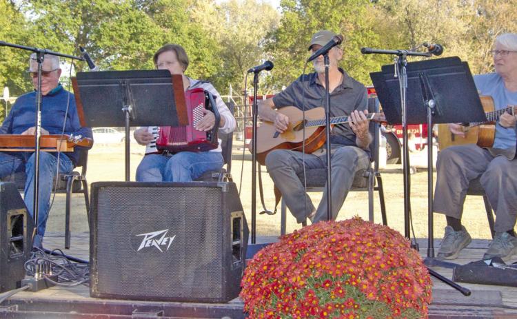 Aunt Bea and Friends band entertained at the Scammon Annual Fall Festival. The band has been part of several festivals in the area and are always popular with their string instruments.