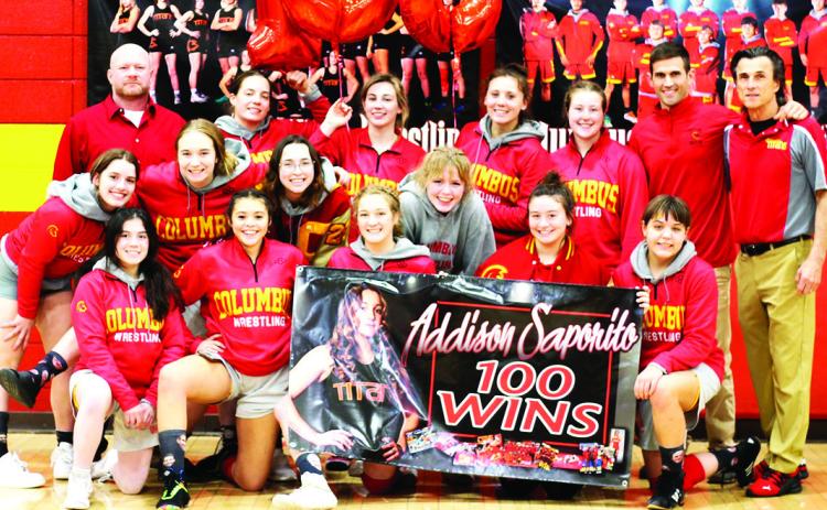 Lady Titan Senior, Addison Saporito, earned her 100th career win, Tuesday night, in a home dual win over Independence at the Columbus Unified High School Gymnasium. Addison celebrated with her team and coaches following the 54-18 win sweep over the Lady Bulldogs.