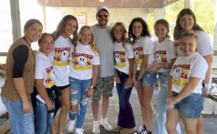 Volunteers from Michelle Mosler’s Community Service Class class joined veteran Jim Eddington at the appreciation lunch held for first responders, soldiers and veterans Monday. Students included Presley Tedlock, Hannah Noel, Faith Henry, Landrey Perry, Tatum Kirk, Natalie Wary, Laney Atkinson, Jaiden Campbell and Amory Neely. Photo by Michelle Mosler.
