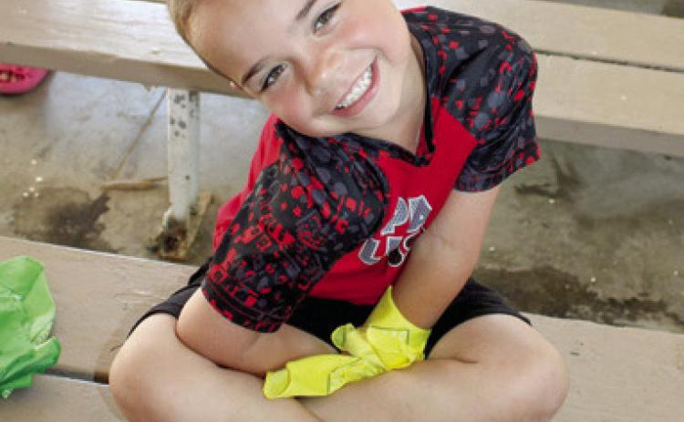 Center Christian Church’s vacation Bible school is in full swing. Area youngsters including Josh Lacen, are learning about “The Great Jungle Journey”. Tonight is the final weeknight program being held in Columbus City Park
