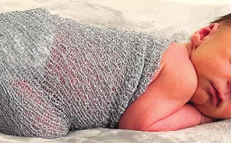 Hodgsons welcome son James Tripp