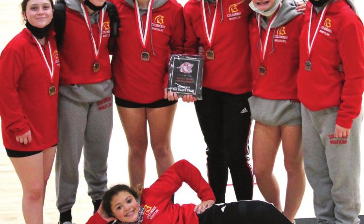 The Columbus Lady Titan Wrestlers placed second at the Burlington Girls Total Team Tournament, Saturday. Columbus captured 141.5 team points with eight wrestlers. Shown with their second place plaque and team medals are Lizzy Welch, Addison Saporito, Dixee Lacen, Emily Welch, Sophie Lloyd, and Madelyn Garcia. Front: Brooklyn Lima. Not pictured, Jailyn Rodriguez. Courtesy Photo.