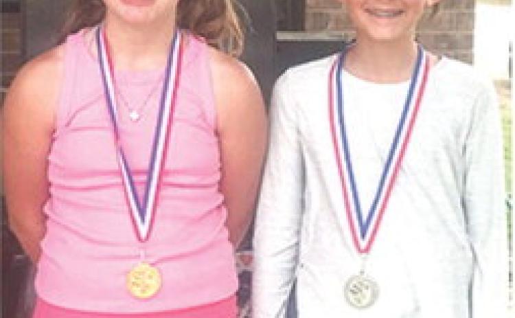 Alaina Smiley placed first and Olivia Dainty placed second in the girls 9-11 division of the SEK Junior League Golf Tournament at the Katy Golf Course in Parsons, Thursday. Courtesy photo.