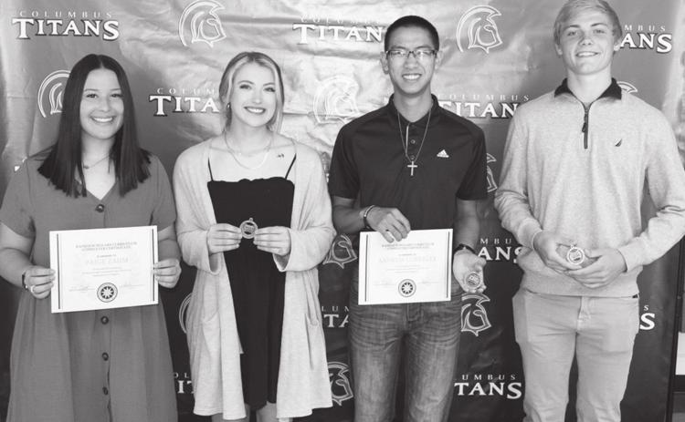 Columbus High School Seniors, Paige Zahm (Kansas Scholar Curriculum); Evie Parsons (CNC Academic All League); Andrew Coberley (Kansas Scholar Curriculum and CNC Academic All League); and Sylas Stone (CNC Acacemic All League) received recognition at the CUHS Senior Awards Assembly at the high school gymnasium in May.