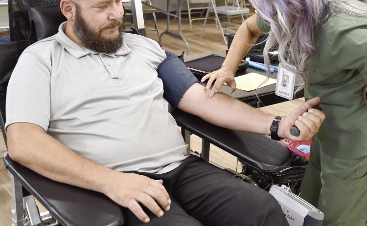 Community Blood Center of the Ozarks organized a blood drive in Columbus Monday, August 17. Richard Parker was one of more than 30 people who selflessly donated. CBCO collected more than four gallons of blood across all donors who also received a premium beach towel for their contributions.