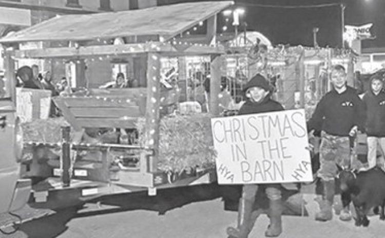 Live animals were a vital part of the Heritage Youth of America float in the annual Columbus Christmas Parade.