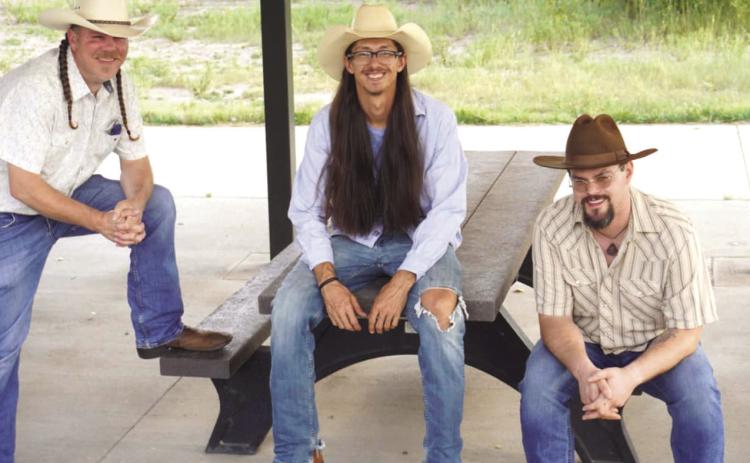 Columbus grad plays lead guitar Thursday