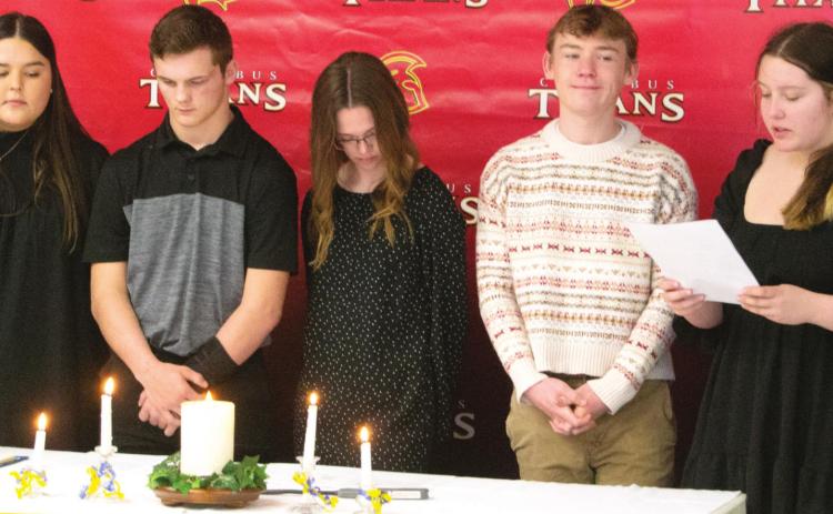 Columbus Unified High School’s National Honor Society inducted nine new students into their organization on March 30. Various members of existing leadership welcomed the new inductees including (left to right) Treasurer Kate Zahm, Vice President Trent Smith, President Lily Mooney, and members Casey Soper and Alexa Parker. Photo by Jacob Spencer.