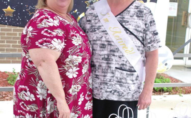 Health Department Director Betha Elliott says goodbye to a friend and co-worker as Debbie Murray retires after 30 years and eight months of service to citizens of Cherokee County.
