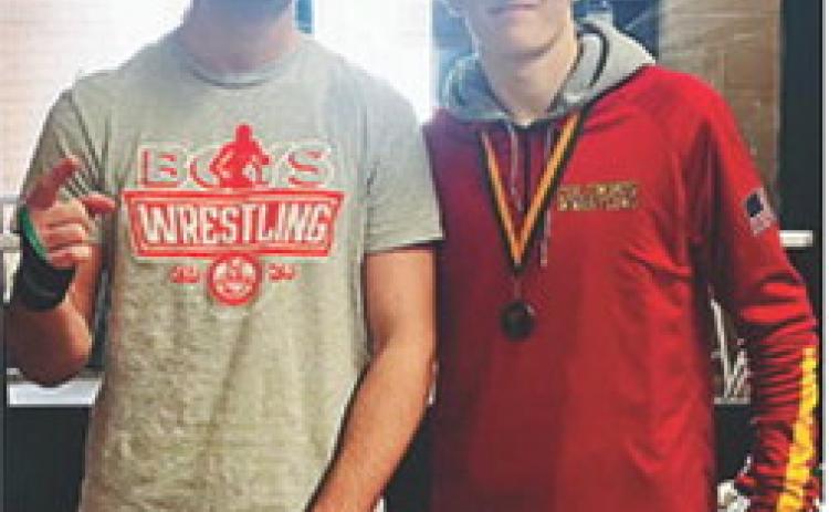 Titan Sophomore, Mason O’Banion, took first place at the 2025 Bobcat Classic in the 175-pound weight class. Senior, Korbyn Newberry, placed seventh in the 120-pound weight class at the highly competitive wrestling tournament hosted by Basehor-Linwood High School. Complete results on page seven of today’s News-Report. Courtesy photo.