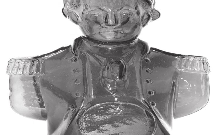 This circa 1876 Simon’s Centennial Bitters bottle represents George Washington when he was commander in chief of the Continental Army, 100 years before. The red amber shaded to yellow amber bottle is 10 inches high and auctioned for $2,640.