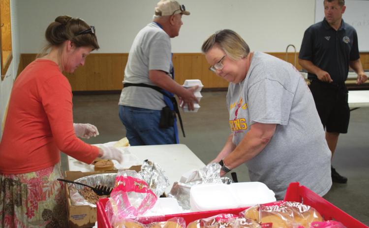 Community turns out for pulled pork lunch benefit