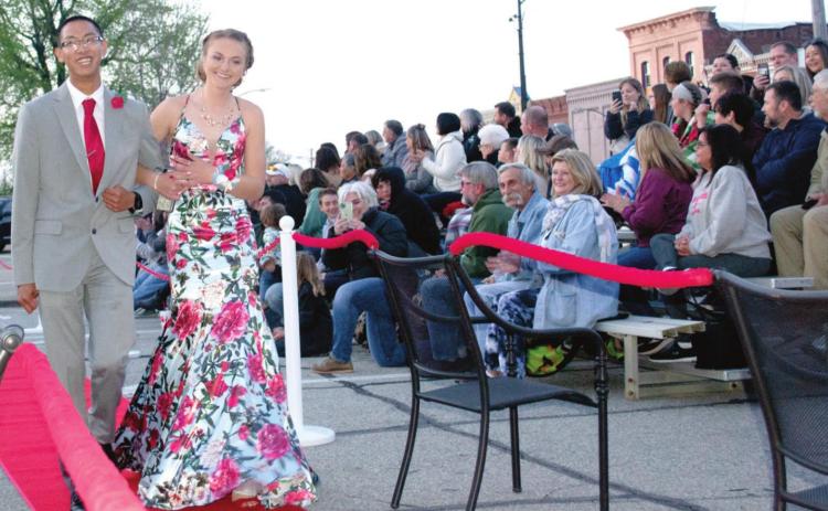 Arriving first at the Columbus Unified High School prom walk-in