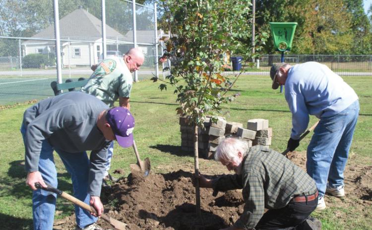 PRIDE busy planting around community