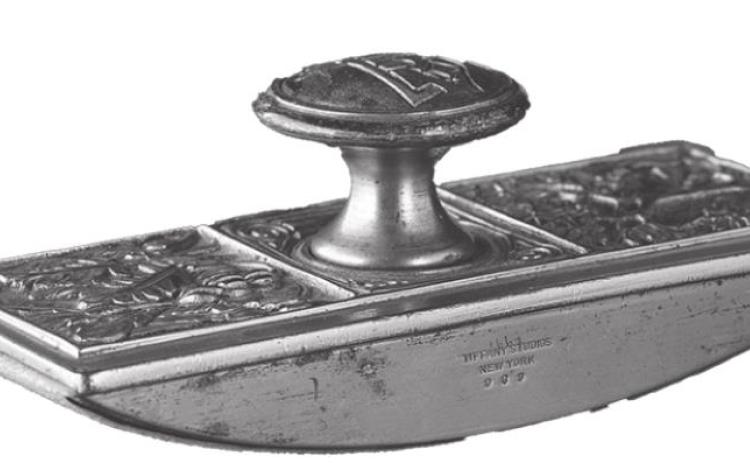 This rocker blotter sold for $161 at a Cowan’s auction. Today, it has more value as a piece of Tiffany craftsmanship than as a useful desk accessory.