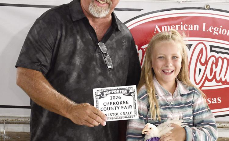 Stetson Danley’s Grand Champion chicken brought in a $650 premium from Puddle Jumpers Liquor Store represented by Rodney Oels.