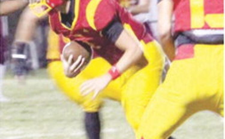 Columbus Junior, Cole Howard, snatches the Girard pass near mid-field with 50 seconds on the game clock to seal the win for the Titans, 42-36, in the Kansas Class 3A, District 1, Hall of Fame win, Friday night at Titan Stadium.