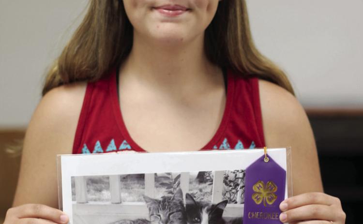 During last year’s photo class, Airauna Sharp received a purple ribbon for her kitten portrait.