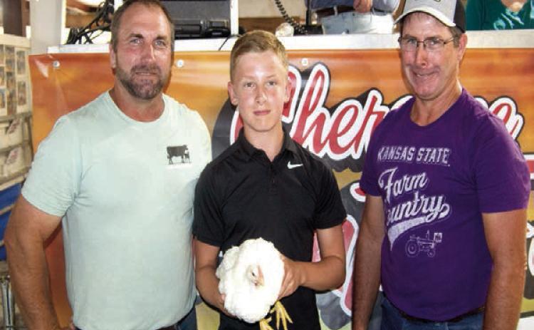 The grand champion poultry shown at the Cherokee County Fair by Lone Elm Beaver 4-H Club member Brayden Green received a premium bid of $700 from Stone Brothers Farm for the broiler. There were eight entries in the poultry sale and they received $3,800 in premiums.