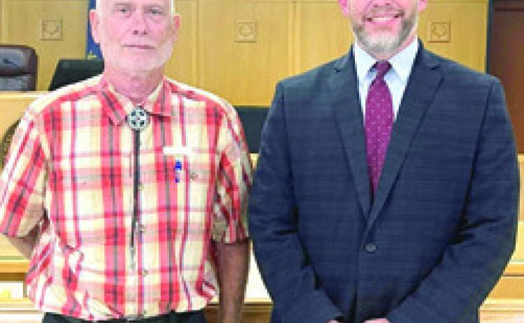 County Chairman Greg Walker stood next to County Attorney elect Kurt Benecke a few minutes after the GOP Committee Men and Women voted him as their choice to replace Nathan Coleman.