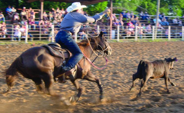 Rodeo calf roper Riley Bruce from Caney was the leader following Saturday nights calf roping event at the annual Columbus Rodeo. The successful wrapped up Sunday night at the Columbus Saddle Club arena.