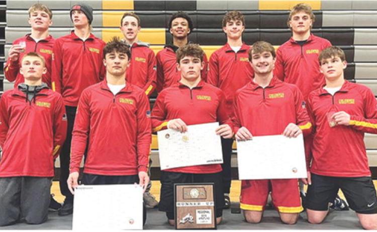 The Columbus Titan Wrestling Team captured the Kansas Class 4A Regional C Runner-up plaque in Paola, Saturday. Three Titans came away with regional champion titles and three placed third to advance to the state tournament. Members of the regional runner-up team are front row: Carlson Britt, Jayden Rodriguez, Kash Smith, Mason O’Banion, and Shade Schuberger. Back row: Chase Pelt, Cal Saporito, Denver Hughes, Kai Langerot, Wyatt Pool, and Braun Stone. Courtesy photo.