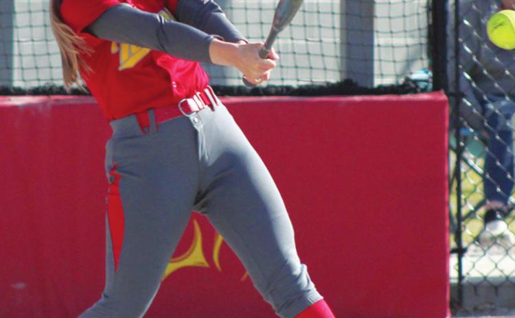 Lady Titans tame Purple Dragons