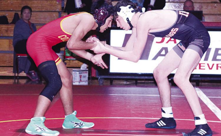 Southeast Lancer Sophomore, Langstyn Arther-Soliven, wrestles with the Columbus Titans during regular season matches. Arther-Soliven placed third at the Kansas Class 3A Regional and will represent Southeast at the state tournament Friday and Saturday at Fort Hays State University.