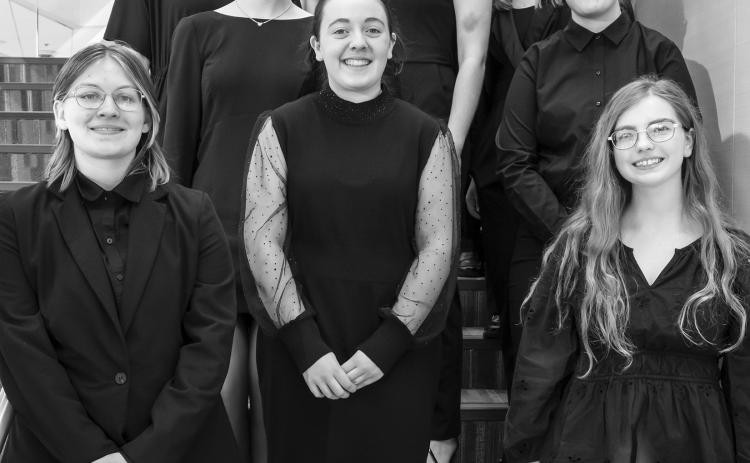 Southeast Kansas Music Educators Association District Band honorees are front to back: Madeline Graham, Ava Allison, Ava Hulvey, Ruby Stover, Madelyn Coons, Casey Dietz, Katelyn Draeger, Mackenzie Richards, Kassidy Gharmalkar, Anna Head, Marissa Lawson, Kiera Gharmalkar, and Owen Prauser. Courtesy photo.