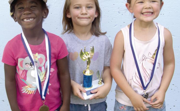 Pulling the full 30 feet, Anna Son placed first in the five-year-old division at the annual Pedal Tractor Pull July 25. Lillian Hale placed second with a pull of 25 feet 6 inches. Kyra Lacen placed third with four feet 11 ½ inches.