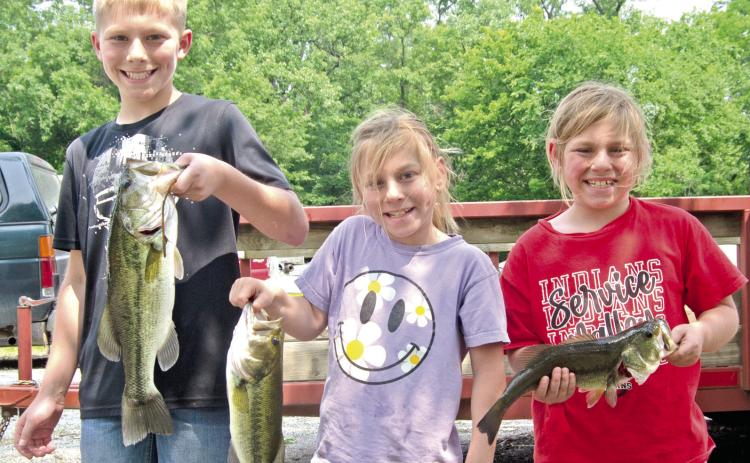 Tate Godfrey received the ”Big Fish” plaque at the 47th Annual Cherokee Sportsman’s Association, with his 2.32-pound bass. His sisters were right behind him with Mattie catching a 1.47-pound bass and Mia landing a 1.43-pounder. The event was held at the Sportsman’s Club Saturday afternoon.