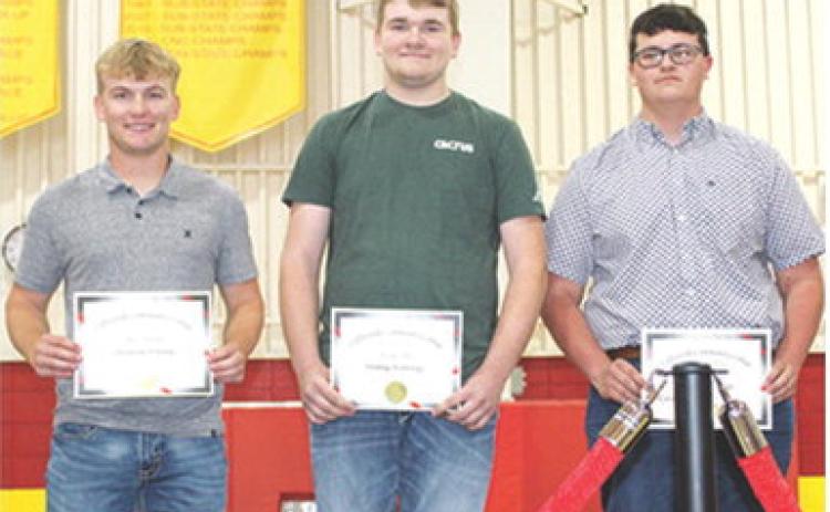 Seniors, Syler Schuberger, Brodey Allison, and Brody Westervelt earned multiple technical certificates through their studies at Coffeyville Community College Technical School while completing their high school coursework. Their certificates were awarded during the Senior Assembly, May 16, at the CUHS Gymnasium. Not pictured, Johnny Perry.