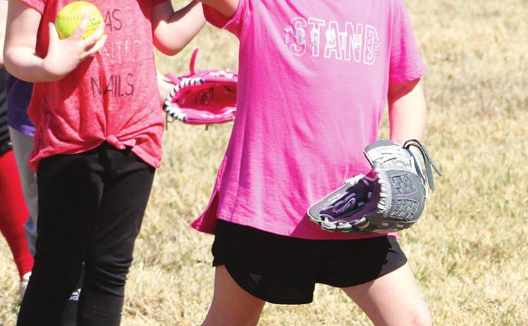 Aliyah Ketcher concentrates on her target during the throwing drill