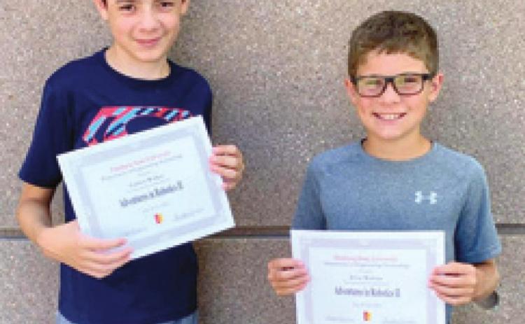 Two local students attend camp
