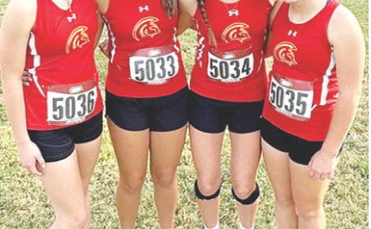 The Columbus Lady Titan Junior High Cross Country Team competed in the Girard Cross Country Meet held at Greenbush Education Center Thursday. Members of the eighth-grade team are: Lyndee Smiley, (third place), Morgan Anderson, and Kinsley Hess (fifth place). Alaina Smiley, placed fourth in the seventh-grade girls race. Courtesy photo.