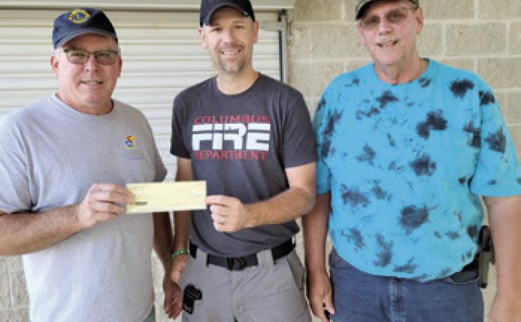 Time is rapidly drawing near for the second annual Freedom Fest sponsored by Columbus Fire Department. The event is planned for Saturday July 8 in Columbus City Park. Recently the Columbus Lions Club made a donation of $500 to the event. Lions Mark Winter and Brad Gleason presented Fire Chief Steven Burton with the check. Courtesy photo.