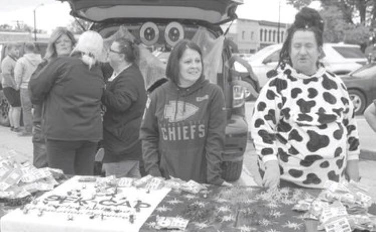 ber of Commerce Halloween Walk Friday, October 31. The line to the event wrapped north Kansas and west on Maple.