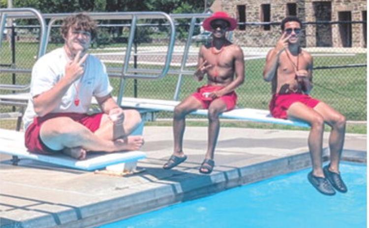 Lifeguards don’t get a break too often, but Jaden Lopp, Josiah Palmer and Jakai Langerot had a short moment to relax at the City Pool recently.