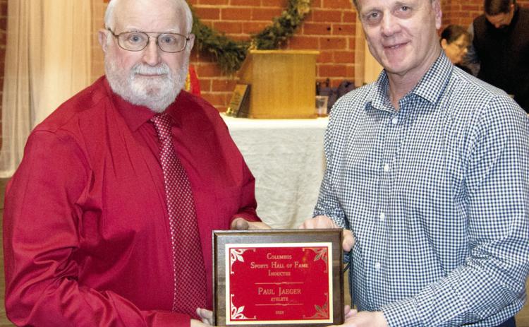 Paul Jaeger was inducted into the Columbus Sports Hall of Fame and presented a plaque by Kerry Sachetta to commemorate his joining other outstanding athletes.