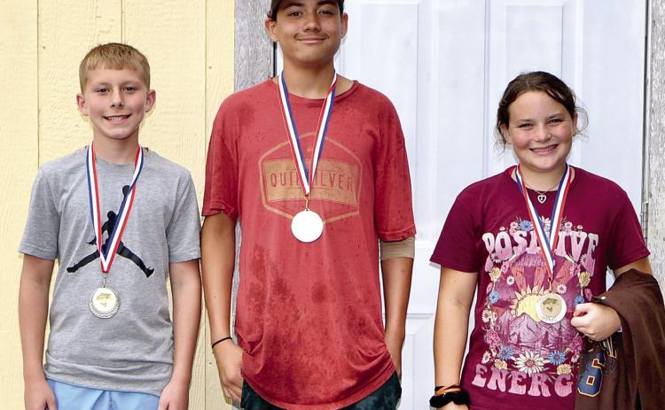 Winners in the West Mineral Eagles fishing derby ages 11-15 bass division were Tate Godfrey, first, 5.03 pounds; Marcell Nash, second, 4.32 pounds and Oakley Hamiltion, 4.03 pounds. Courtesy photo.