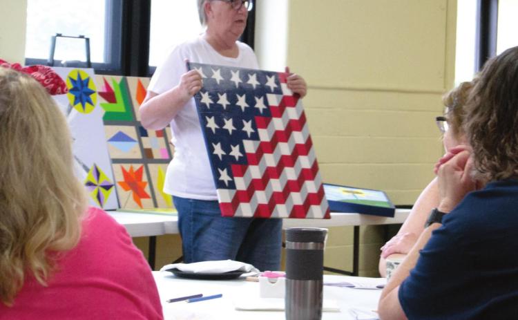 Barn quilt painting featured at scrappers extravaganza