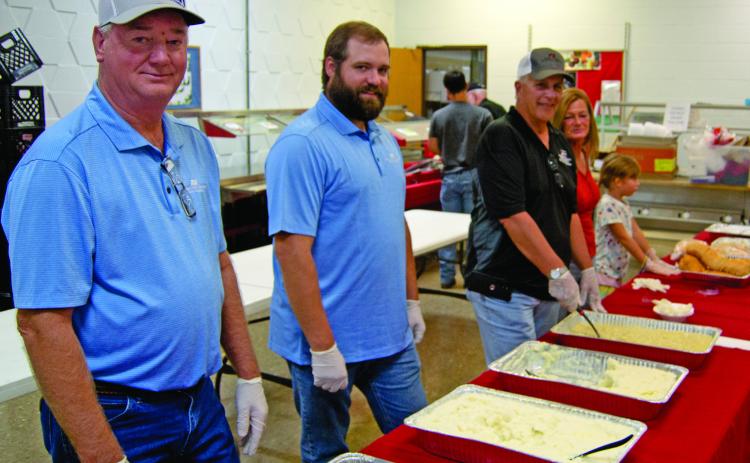 Directors of the Farm Bureau were serving dinner at the organizations annual meeting on Monday evening. The dinner was held in the Columbus High School Cafeteria and the meeting followed in the auditorium. Serving were Warren Scott, Matt Atkinson and Bill Reid.