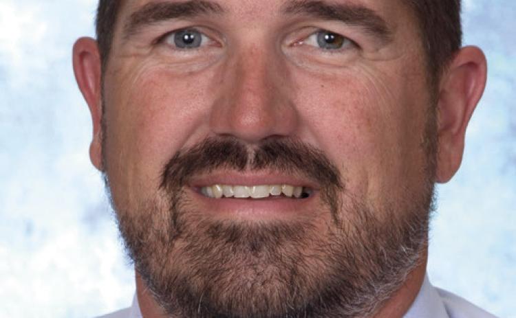 Grundy named to replace Dr. Smith