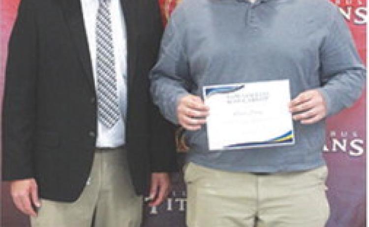 Carter Henry received the Tom Goettel Scholarship during the 2025 Senior Assembly held at the Columbus Unified High School Gymnasium, May 16. CUHS Principal and incoming USD493 Superintendent, Dan Grundy presented the scholarship.